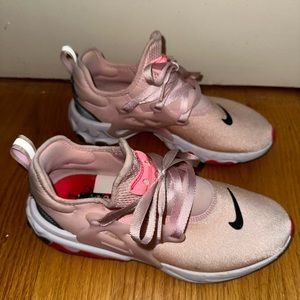 Pink pesto Nike sneakers. Very great condition. You won’t regret buying them.